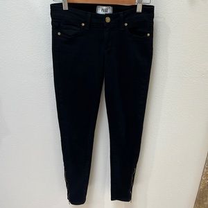 Paige denim. Black skinny jeans. Gold zippers at ankle. Size 25